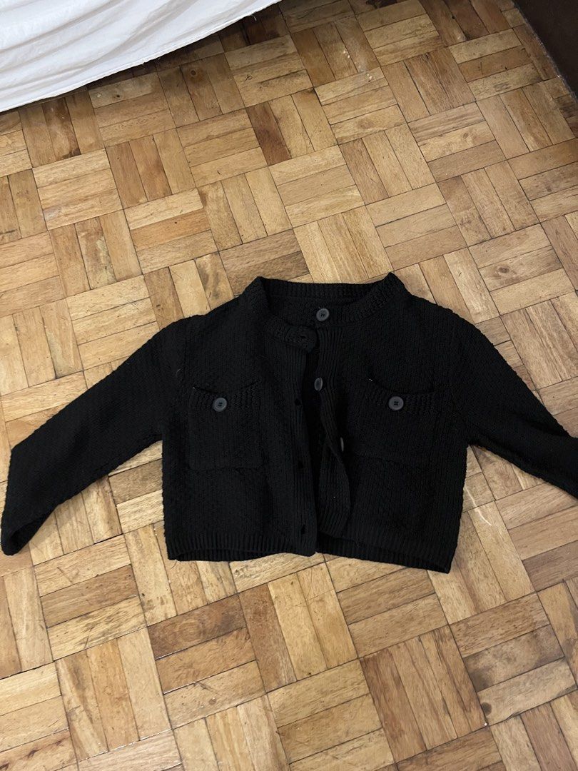 Black Cardigan (Category: Coats, Jackets and Outerwear) located in Manila. Submitted by desanddat (Listing ID 1422369265, Image 1). Description: - Black cropped cardigan - Round neckline - Button-down closure - Long sleeves - Textured knit fabric - Versatile style.