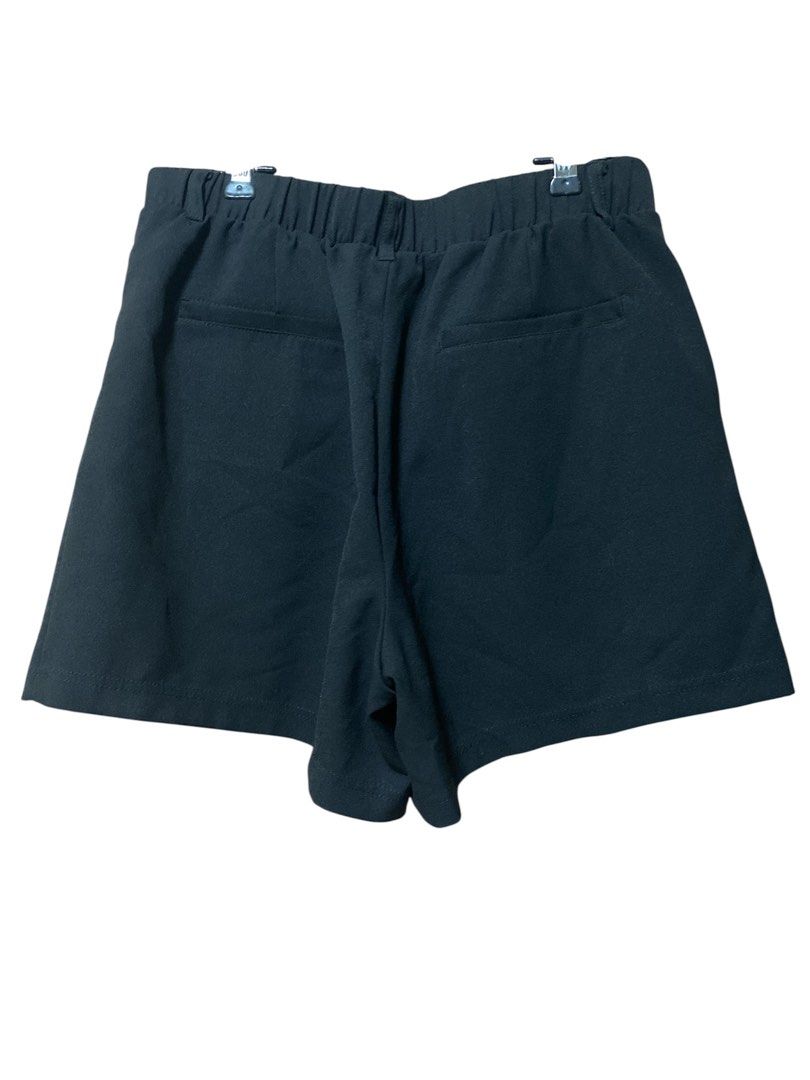 Black Pleated Shorts (Category: Shorts) located in Quezon City. Submitted by mcva2 (Listing ID 1422317122, Image 2). Description: - Brand: BE COOL - Style: Pleated shorts - Color: Black - Features: Elastic waistband, button closure, two front pockets - Fit: Relaxed - Fabric: Smooth.