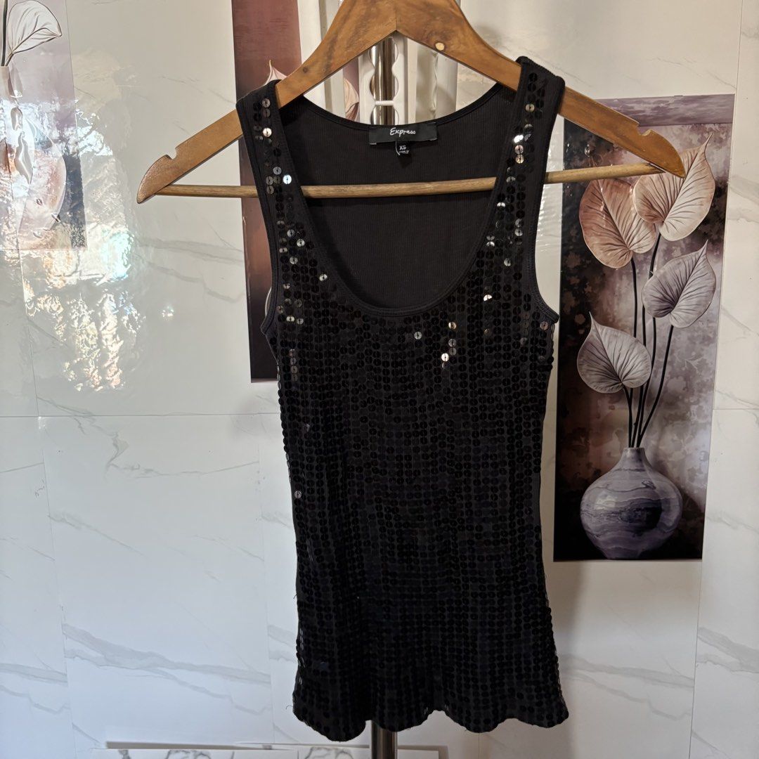 Black Sequenced Fitted Racerback Bodycon Top (Category: Sleeveless) located in Makati City. Submitted by declut_k8 (Listing ID 1422338543, Image 1). Description: .