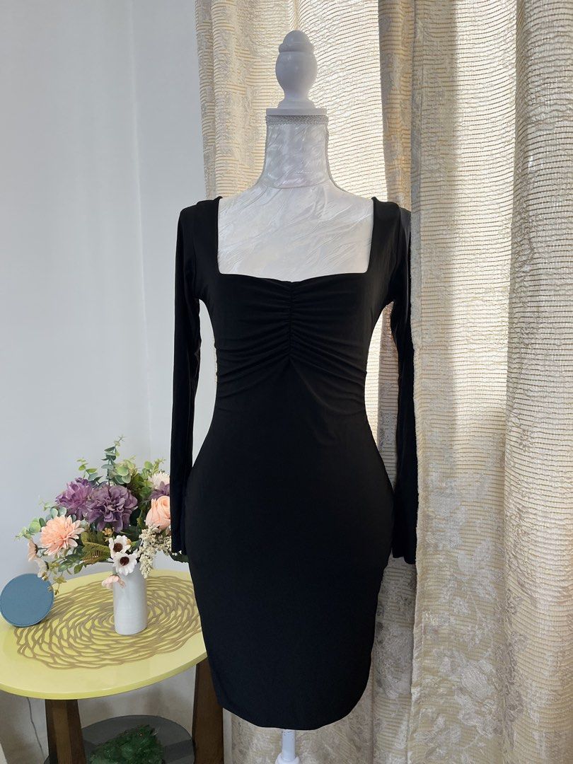 Black Square Neck Long Sleeve Dress (Category: Dresses) located in Cebu City. Submitted by zinzitro (Listing ID 1422323106, Image 1). Description: - Black dress - Square neckline - Long sleeves - Size: Small-Large - Ruched bust detail - Suitable for night outs and special occasions - Smooth, stretchy fabric.