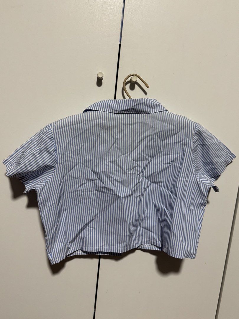 Blue and White Striped Cropped Polo Top (Category: Blouses) located in Quezon City. Submitted by maejichoco (Listing ID 1422348000, Image 3). Description: - fits XS-S - manage expectations loc: QC (banawe area) dm for inquiries.