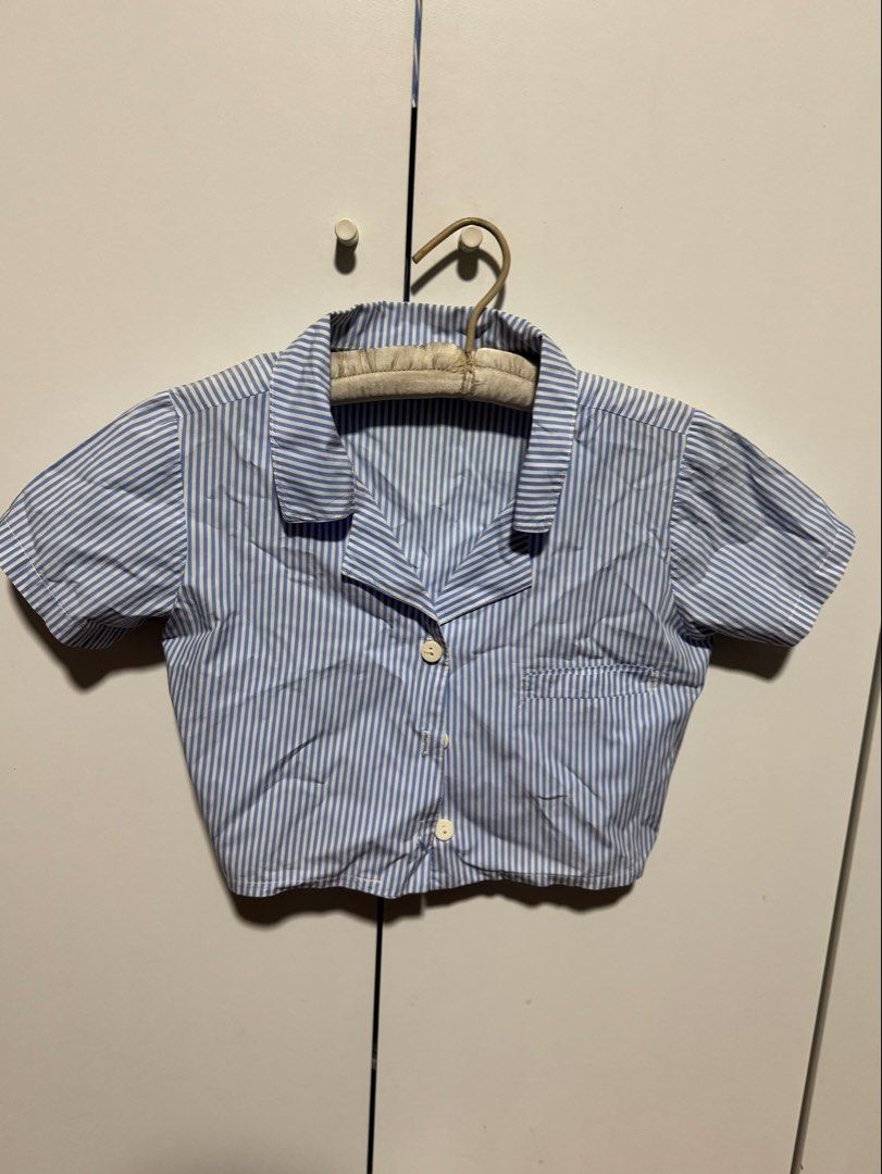 Blue and White Striped Cropped Polo Top (Category: Blouses) located in Quezon City. Submitted by maejichoco (Listing ID 1422348000, Image 2). Description: - fits XS-S - manage expectations loc: QC (banawe area) dm for inquiries.