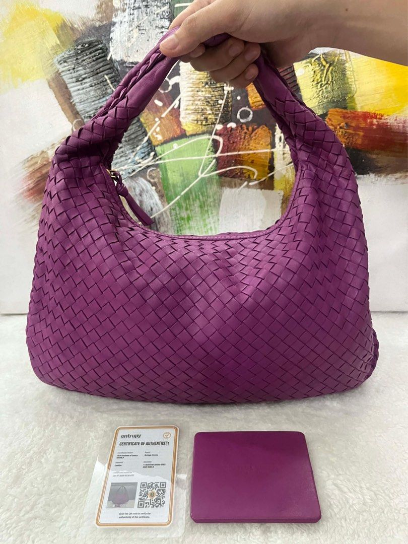 Bottega Veneta Hobo Bag (Category: Luxury Bags & Wallets) located in Paranaque City. Submitted by glenjonluxuryfinds2 (Listing ID 1422341420, Image 1). Description: - Authentic Bottega Veneta hobo bag - Stunning purple color - Signature woven design - Includes matching card holder - Comes with certificate of authenticity - Interior zippered pocket - Made in Italy.