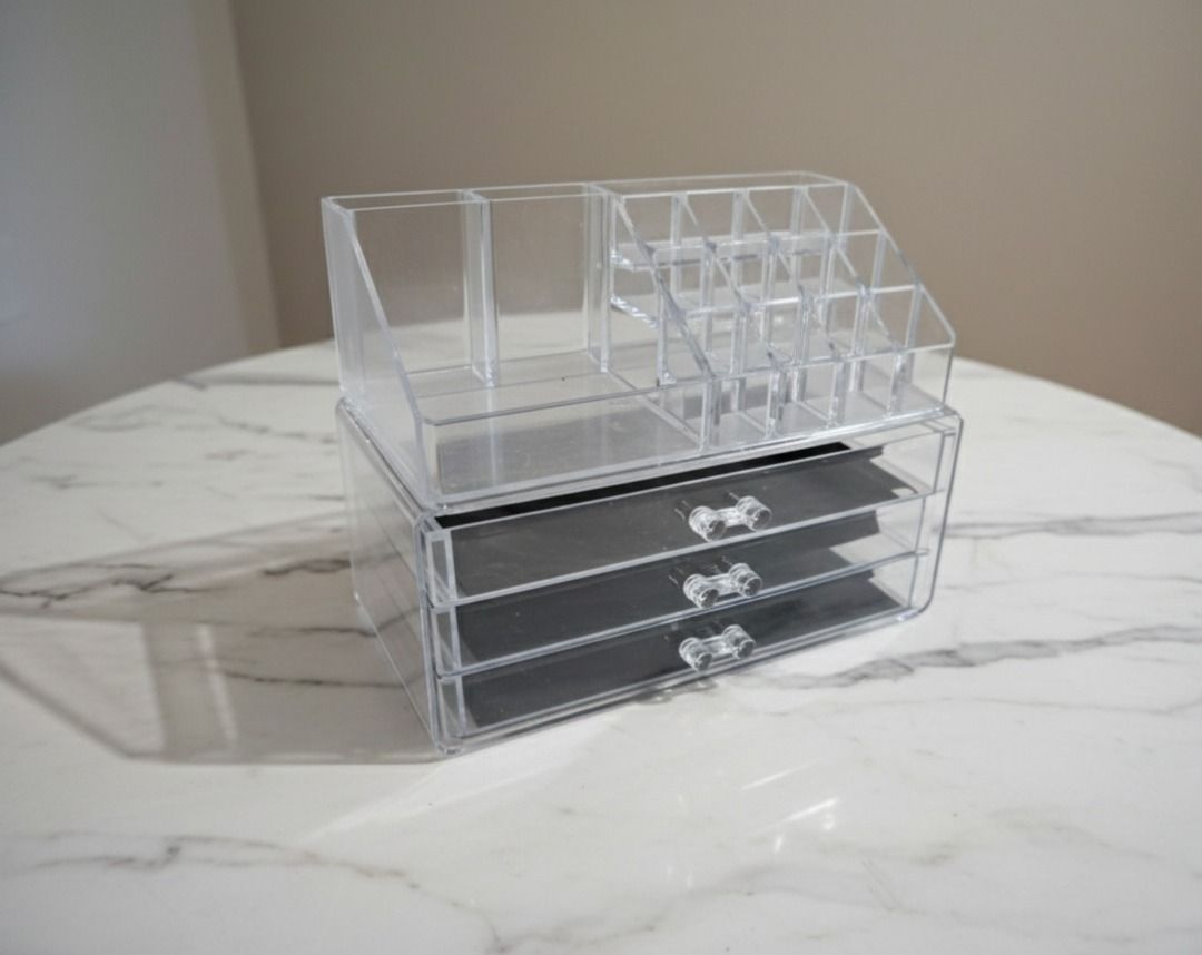 Clear Acrylic Makeup Organizer with Drawers (Category: Makeup) located in Dasmarinas. Submitted by swiftee-17 (Listing ID 1422241209, Image 3). Description: - Clear acrylic makeup organizer - Top section: slots for brushes & lipsticks - 3 drawers for storage - Transparent design for easy visibility - Stylish and practical makeup storage solution.