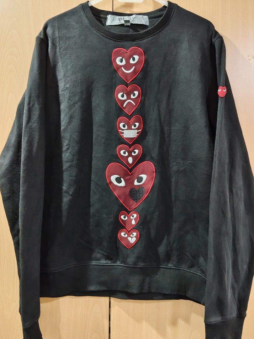 Comme des Garcons PLAY Sweatshirt (Category: Coats, Jackets and Outerwear) located in Makati City. Submitted by ajpmedran (Listing ID 1422380113, Image 1). Description: - Comme des Garcons Play sweatshirt - Multi-heart design - Black - Large on tag - 23in. width - 26in. length.