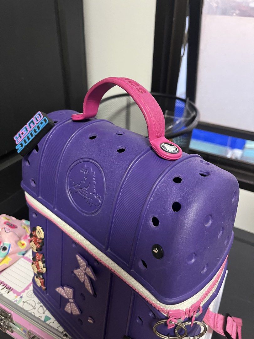 Crocs Purple Backpack with jibitz Minnie Mouse Charms (Category: Diaper Bags & Wetbags) located in Quezon City. Submitted by samirosie0329 (Listing ID 1422357137, Image 3). Description: Original Crocs bag Pls see attached photo for the issues :) .