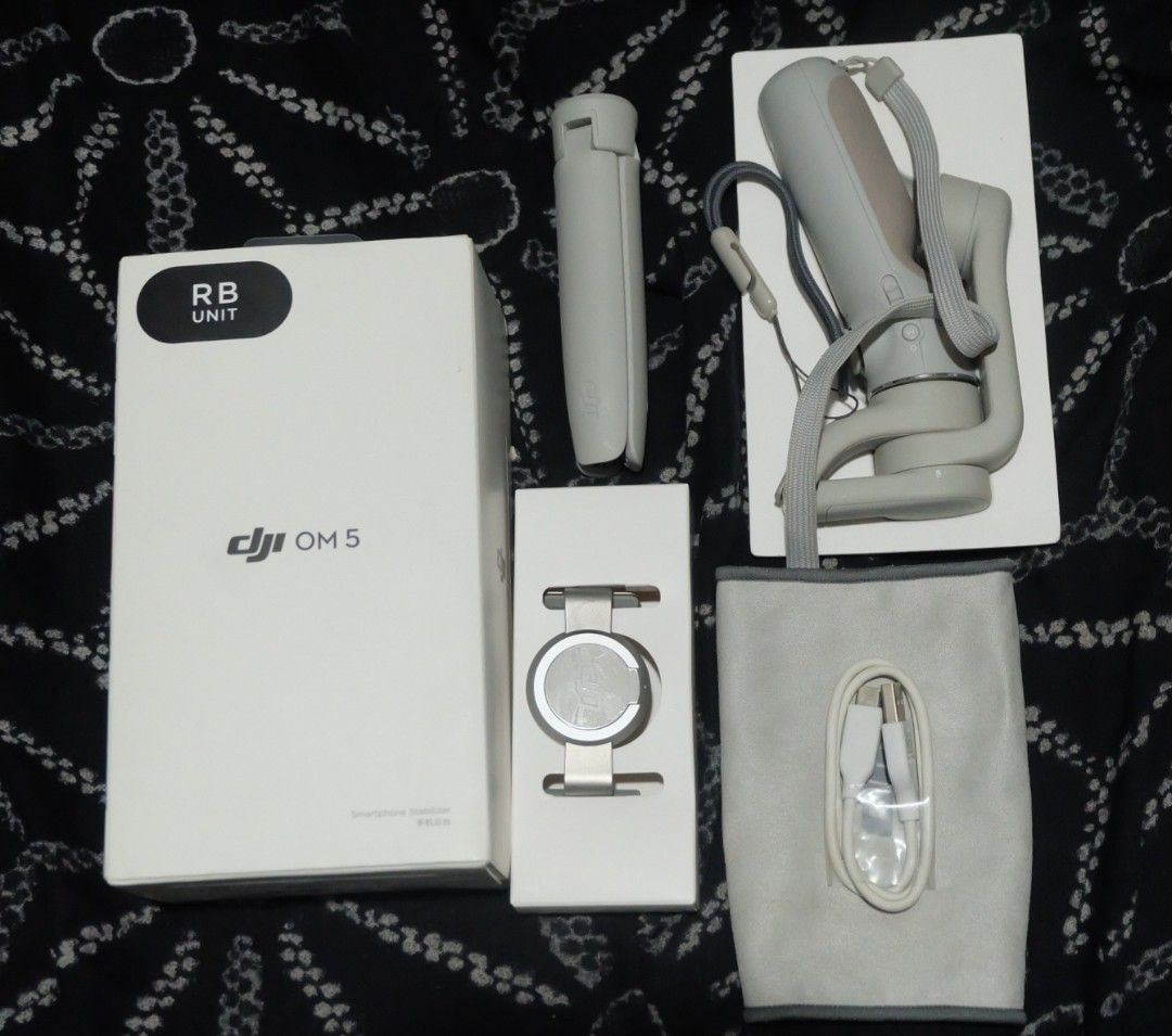 DJI Osmo Mobile 5 Refurbished Unit (Category: Mounts & Holders) located in Manila. Submitted by jayveepas (Listing ID 1422383867, Image 1). Description: Selling: DJI Osmo Mobile 5 Refurbished Unit - Bought from DJI official website - Used 3-4 times mostly concerts - Complete inclusion (see pics) RFS: Decluttering For shipping: - Lalamove or Grab - Buyer to book and shoulder the shipping cost - Buyer can send payment once rider arrives and verifie
