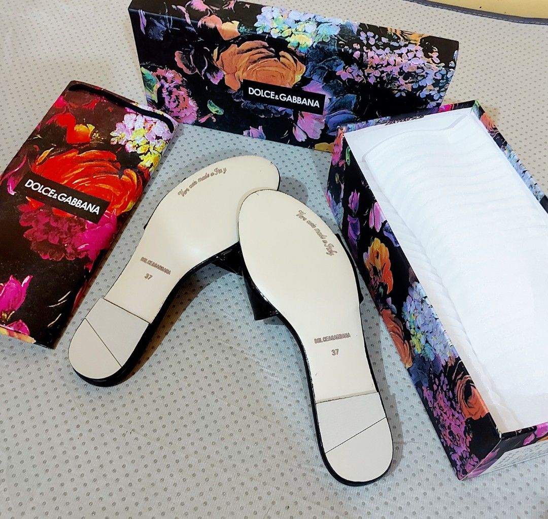 Dolce & Gabbana DG Embellished Sandals (Category: Flats & Sandals) located in La Trinidad. Submitted by marksols (Listing ID 1422243668, Image 3). Description: - Dolce & Gabbana sandals - Features iconic crystal-embellished DG logo - Black patent leather finish - Size 37 - Includes original box and dust bag - Made in Italy.
