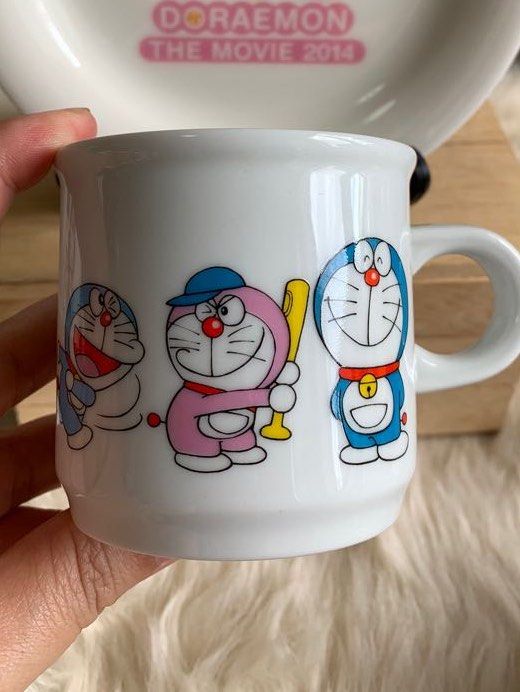 Doraemon cup (Category: Coffee & Tea Tableware) located in Calamba. Submitted by cur8d (Listing ID 1148433871, Image 1). Description: saucer 80 - sold cup 150 .