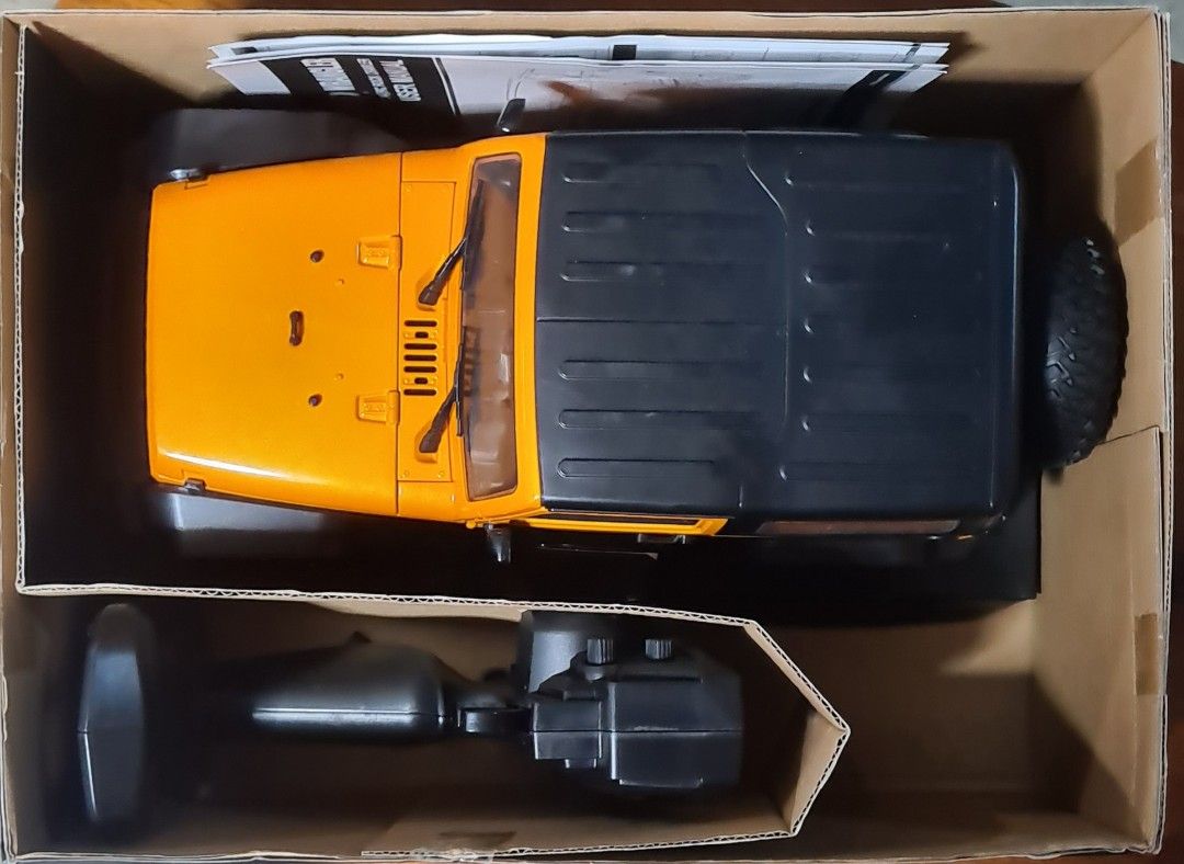 Double E Jeep Wrangler RC Rock Crawler 4x4 Orange (Category: Remote Control Toys) located in Pio Duran. Submitted by henzelhannah (Listing ID 1422246893, Image 3). Description: PTPA; Double E Jeep Wrangler RC Rock Crawler - 4x4 four-wheel drive - Full proportional control - Working lights - High-torque servo and alloy shocks - Planetary gear reducers - 2.4GHz remote control - Suitable for ages 6+ - Original price: P7,199.00 09159248299.