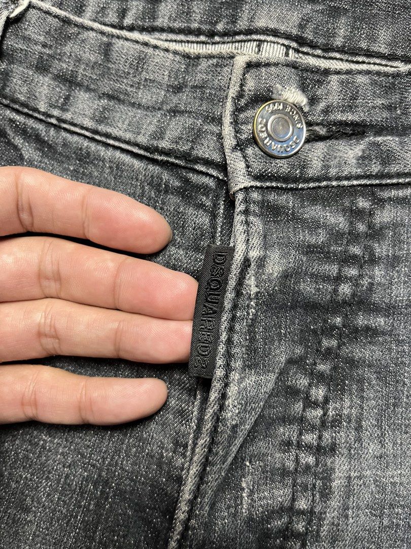 Dsquared2 Denim Shorts - Size 48 (Category: Shorts) located in Davao. Submitted by repeats.exe (Listing ID 1422346910, Image 3). Description: - Authentic Dsquared2 denim shorts - Dark grey wash - Distressed detailing with paint splatters - Button closure - Classic five-pocket design - Made in Italy - Button fly - Visible brand tag - Classic denim look Size: 32 Length: 18 Inches Leg opening: 8 1/2 inches Condition: Good - Excellent Issue: None Dir