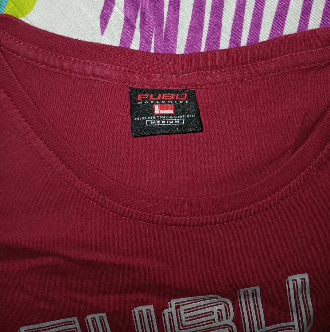 FUBU New York T-shirt - Medium (Category: Tshirts & Polo Shirts ) located in Manila. Submitted by 3Nel5 (Listing ID 1422352191, Image 2). Description: - FUBU New York T-shirt - Color: Maroon - Size: Medium - Features the FUBU logo in silver (outlined) - Crew neck and short sleeves - Plain maroon back - Made of soft material - Ideal for casual wear.