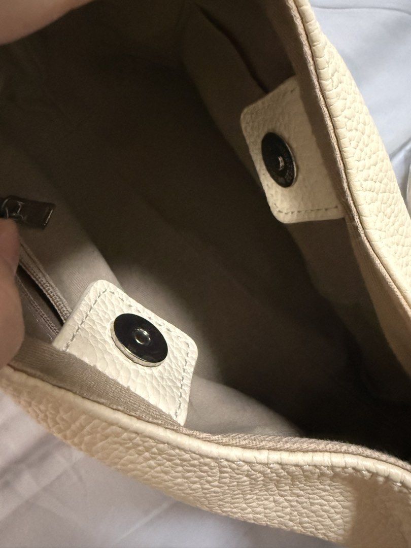 Genuine Leather Handbag with Shoulder Strap (Category: Shoulder Bags) located in Dasmarinas. Submitted by denmae (Listing ID 1422282759, Image 2). Description: Genuine Cowhide leather Can be used as handbag; also comes with long strap for bodybag Interior pocket with zipper Used once for a trip With minor signs of usage; not that visible.