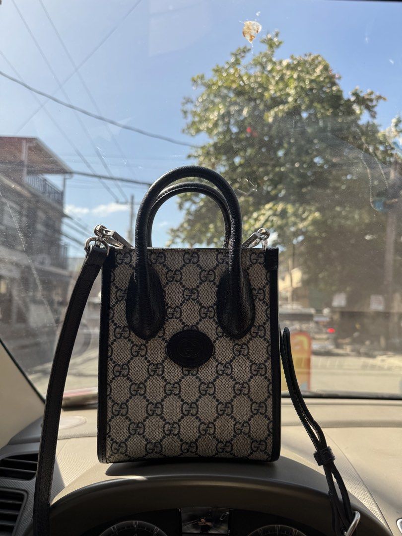 Gucci GG Supreme Mini Tote Bag (Category: Luxury Bags & Wallets) located in Manila. Submitted by leighashle66037 (Listing ID 1422356779, Image 1). Description: - Iconic GG Supreme canvas - Leather handles and trim - Detachable shoulder strap - Light-colored fabric lining - Silver-tone hardware with Gucci branding - Comes with original tags.