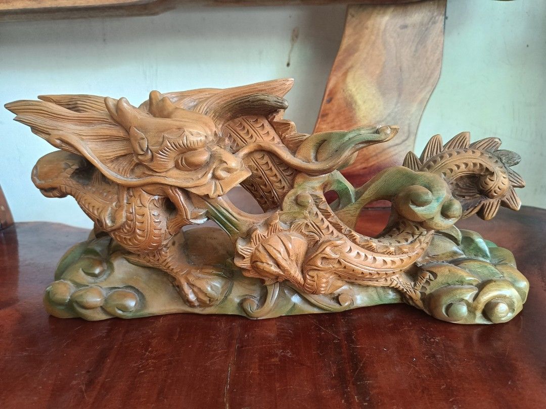Hand Carved Wooden Dragon Statue (Category: Figurines & Statues) located in Imus. Submitted by ABrielleC (Listing ID 1422301137, Image 2). Description: Wooden Material Height-6in Length-13.5 Width-3.5in Weight-1.25kg Japan Surplus Item First to pay Loc Imus Cavite.