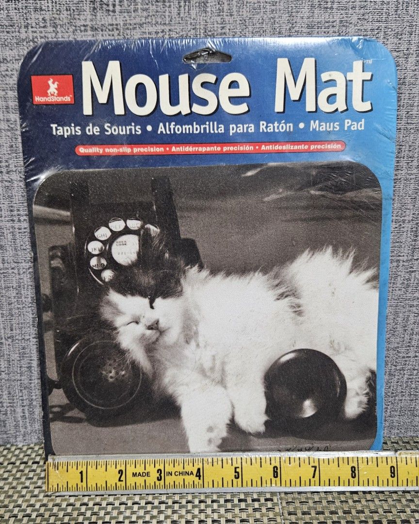 Handstands Mouse Mat Cat Design (Category: Mouse & Mousepads) located in Rizal. Submitted by cherry_garcia (Listing ID 1422270283, Image 3). Description: - Brand new Handstands mouse mat - Features a cute cat design - Non-slip surface for precise mouse control - Rectangular shape - Suitable for computer mouse use - Comes in original packaging with a blue patterned back.