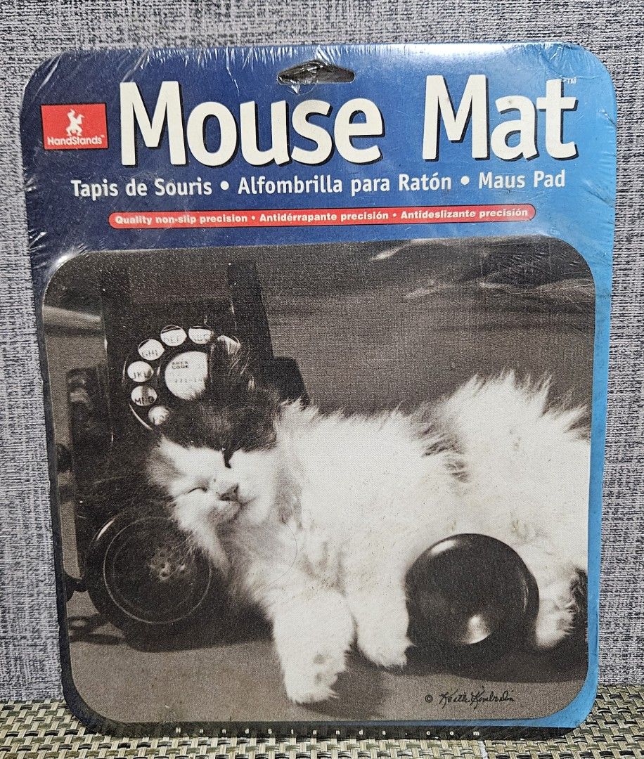Handstands Mouse Mat Cat Design (Category: Mouse & Mousepads) located in Rizal. Submitted by cherry_garcia (Listing ID 1422270283, Image 1). Description: - Brand new Handstands mouse mat - Features a cute cat design - Non-slip surface for precise mouse control - Rectangular shape - Suitable for computer mouse use - Comes in original packaging with a blue patterned back.