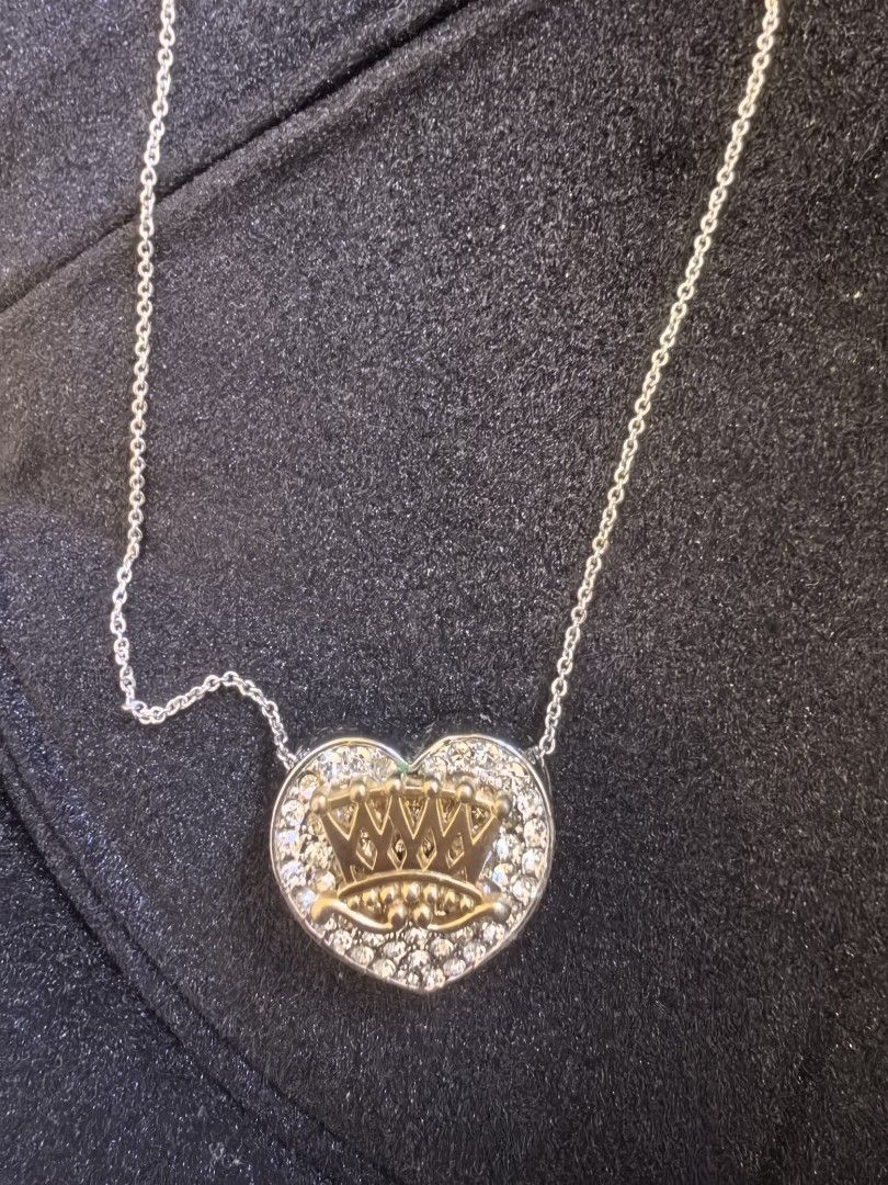 Heart Crown Pendant Necklace (Category: Necklaces) located in Manila. Submitted by jjh1027 (Listing ID 1422259004, Image 2). Description: - Heart-shaped pendant - Gold-toned crown design - Sparkling accents - Stylish accessory.