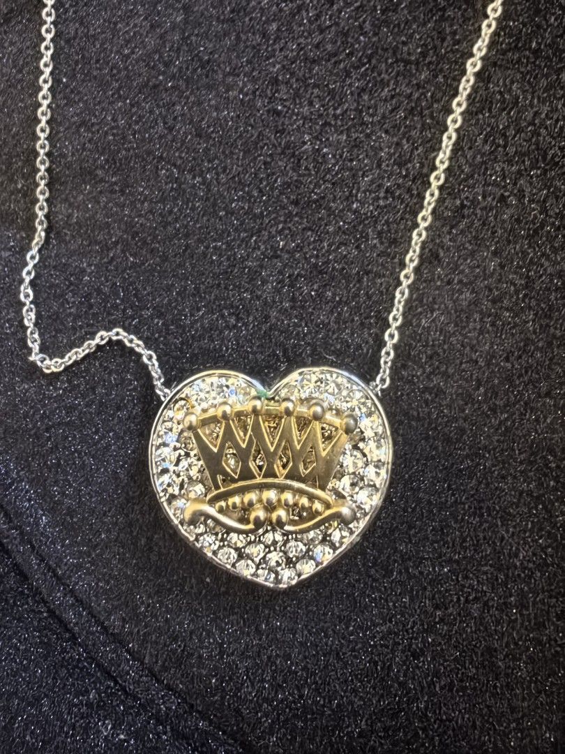 Heart Crown Pendant Necklace (Category: Necklaces) located in Manila. Submitted by jjh1027 (Listing ID 1422259004, Image 1). Description: - Heart-shaped pendant - Gold-toned crown design - Sparkling accents - Stylish accessory.