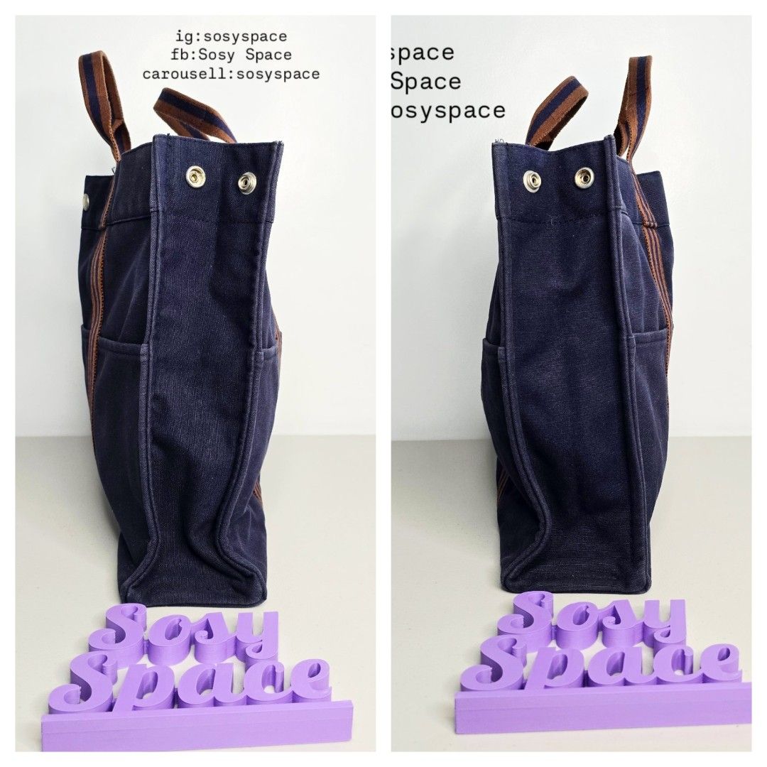 Hermes Navy Blue Canvas Tote Bag (Category: Luxury Bags & Wallets) located in Lucena. Submitted by sosyspace (Listing ID 1422304628, Image 3). Description: H. E. R. M. E. S. L15082304B1P159 Navy Blue Fourre Tout MM Tote Bag 100% Heavy Duty Cotton Brown Stripes Webbing Hand Bag 42 x 10 x 31 cm Inclusion: none Condition: PRELOVED Has minor signs of use Still Excellent Condition for me. Price: Php 18,500 + HF + SF (Best Price Already. No More Haggli