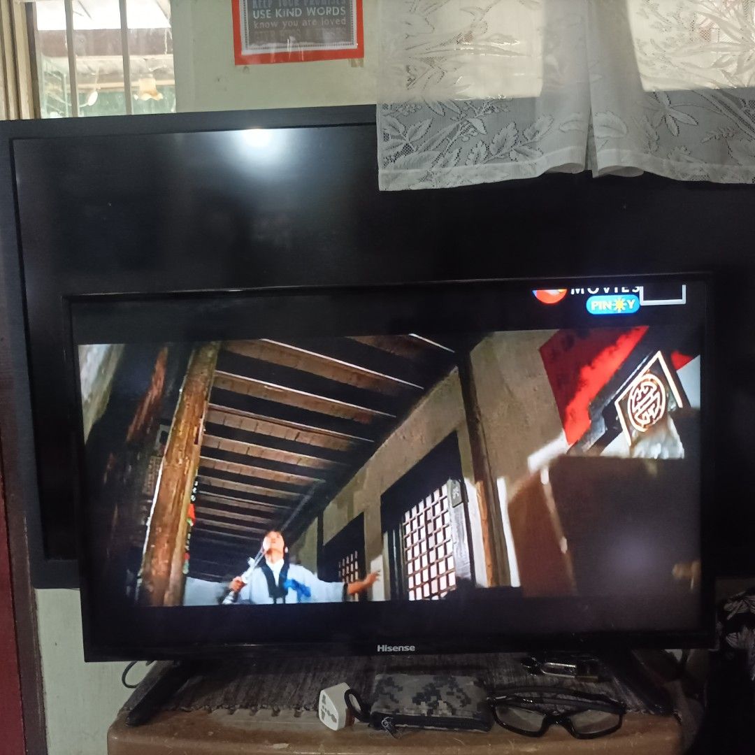 32 inch Hisense TV (Category: TV) located in Manila. Submitted by swiftowl.ce049f (Listing ID 1422342047, Image 3). Description: - Hisense TV with a sleek black frame. - Includes a sturdy stand. - Displays movies with excellent picture quality. - Shows vibrant colors. .