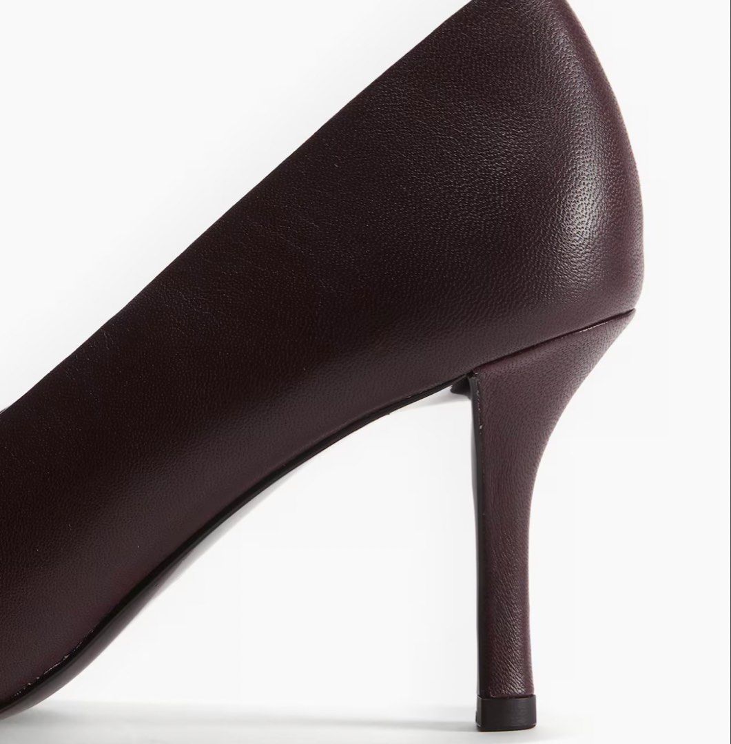 H&M Leather Heels (Category: Heels) located in Marikina City. Submitted by acbwee (Listing ID 1422260674, Image 2). Description: - H&M leather heels - Rich burgundy color - Classic pointed toe - Mid-height stiletto heel - Made of smooth leather - Adds sophistication to any outfit.