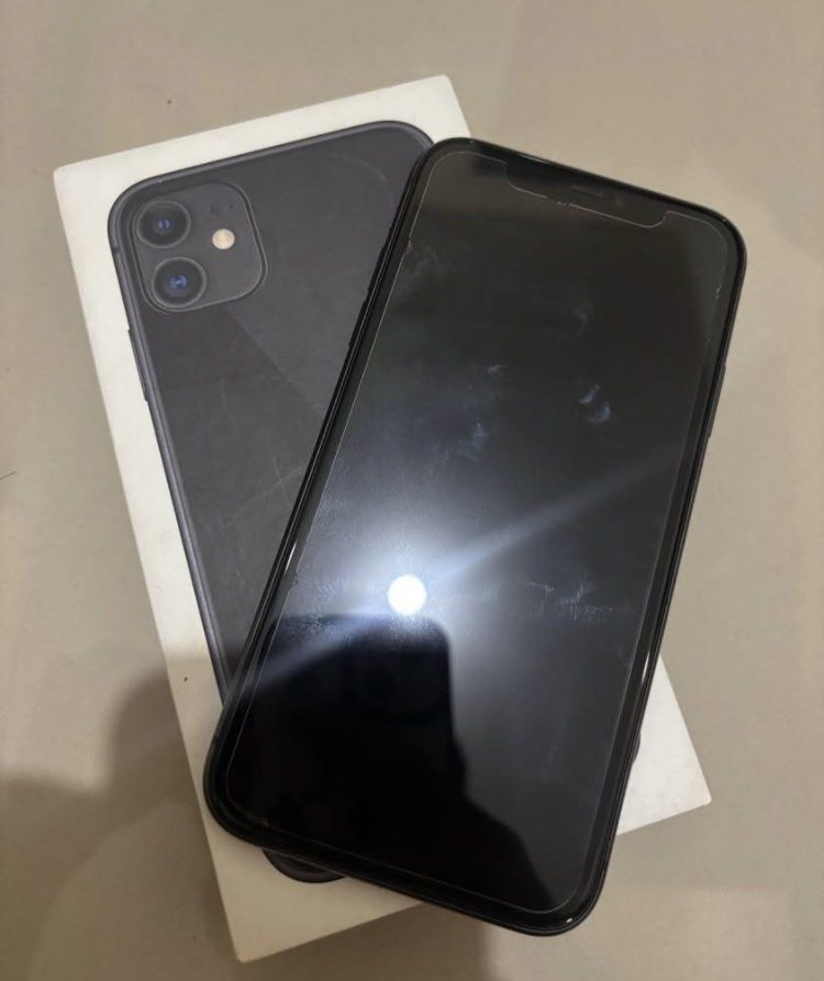 Iphone 11 128gb (Category: iPhone 11 Series) located in Manila. Submitted by micahozawa58156 (Listing ID 1422247023, Image 2). Description: FOR SALE IPHONE 11 128gb COLOR BLACK ORIGINAL BOX ✅ CASE ✅ 73% BH BUT STILL MAKUNAT AND NEVER PA NAPALITAN. HONEST ISSUE: MINIMAL PAINT CHIPS AND DENTS PERO HINDI NAMAN SOBRANG VISIBLE. RFS: NAG UPGRADE NA NEW PHONE. ANTIPOLO/MARIKINA.