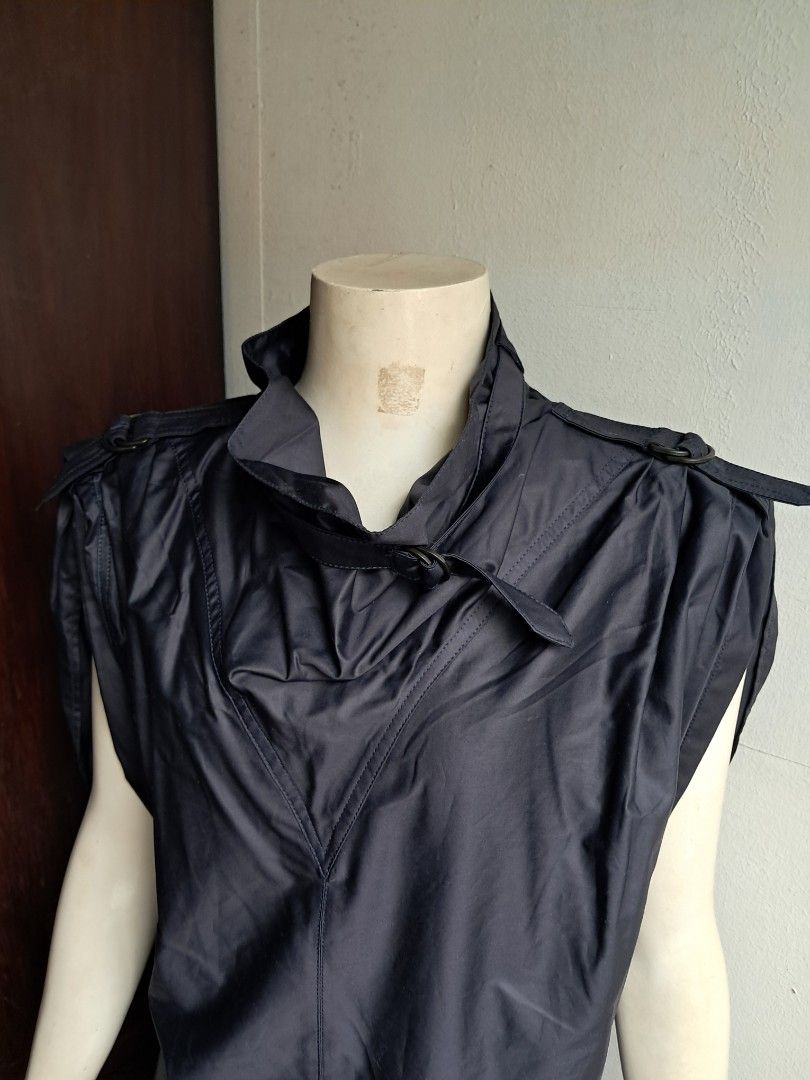 Isabel Marant Tarlame Top Size 36 (Category: Shirts) located in Manila. Submitted by msaludo (Listing ID 1422247518, Image 3). Description: - Isabel Marant Tarlame top - Color: Navy blue - Size: 36 - Fabric: 100% cotton - Made in Romania - Features a collared neckline and short sleeves - Unique, slightly draped design - Includes care instructions excellent condition .