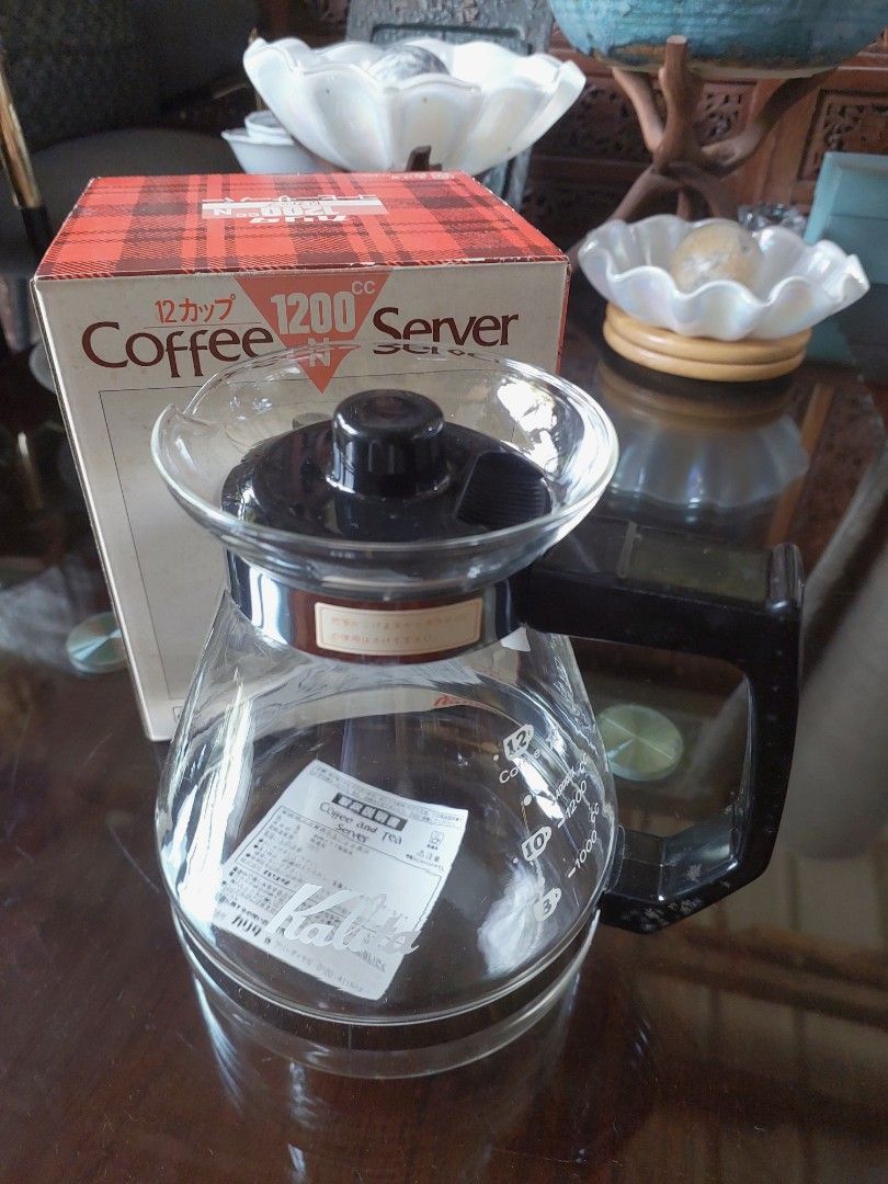 Kalita 1200cc Coffee Server (Category: Coffee & Tea Tableware) located in Bulacan. Submitted by hnbfinds (Listing ID 1422266432, Image 3). Description: - Kalita 1200cc coffee server - Clear glass body - Black handle - Stainless steel lid - 12-cup capacity.