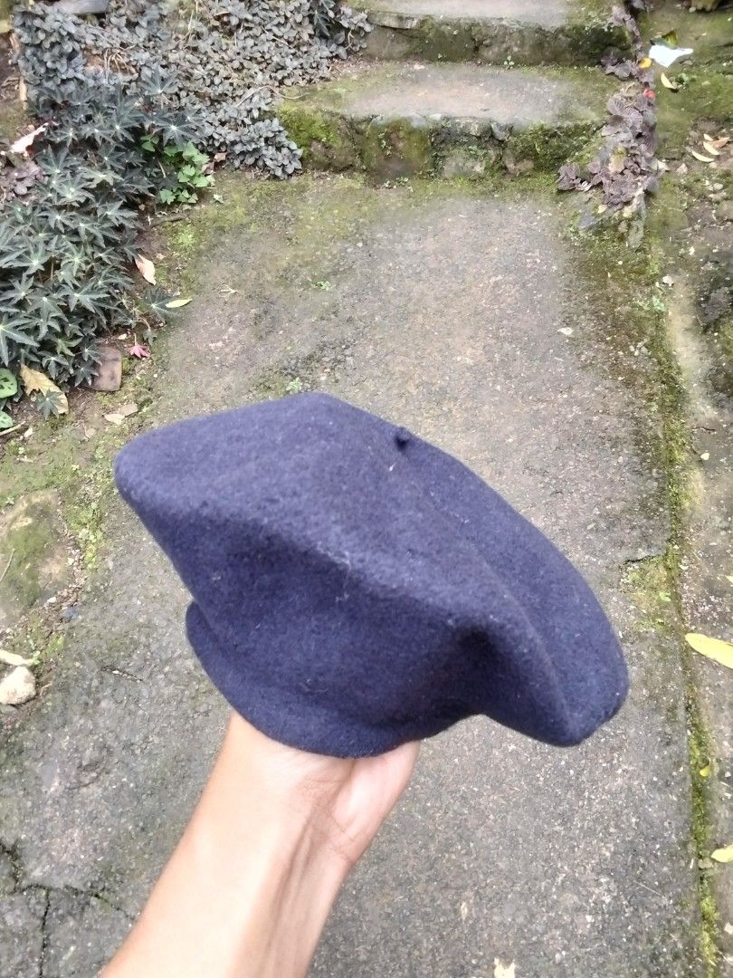 Kangol Wool Beret (Category: Caps & Hats) located in Quezon. Submitted by thrift.21 (Listing ID 1422306729, Image 2). Description: - Vintage Kangol beret - Made of wool - Classic round shape - Features Kangol label inside - Versatile accessory - Stylish and timeless.