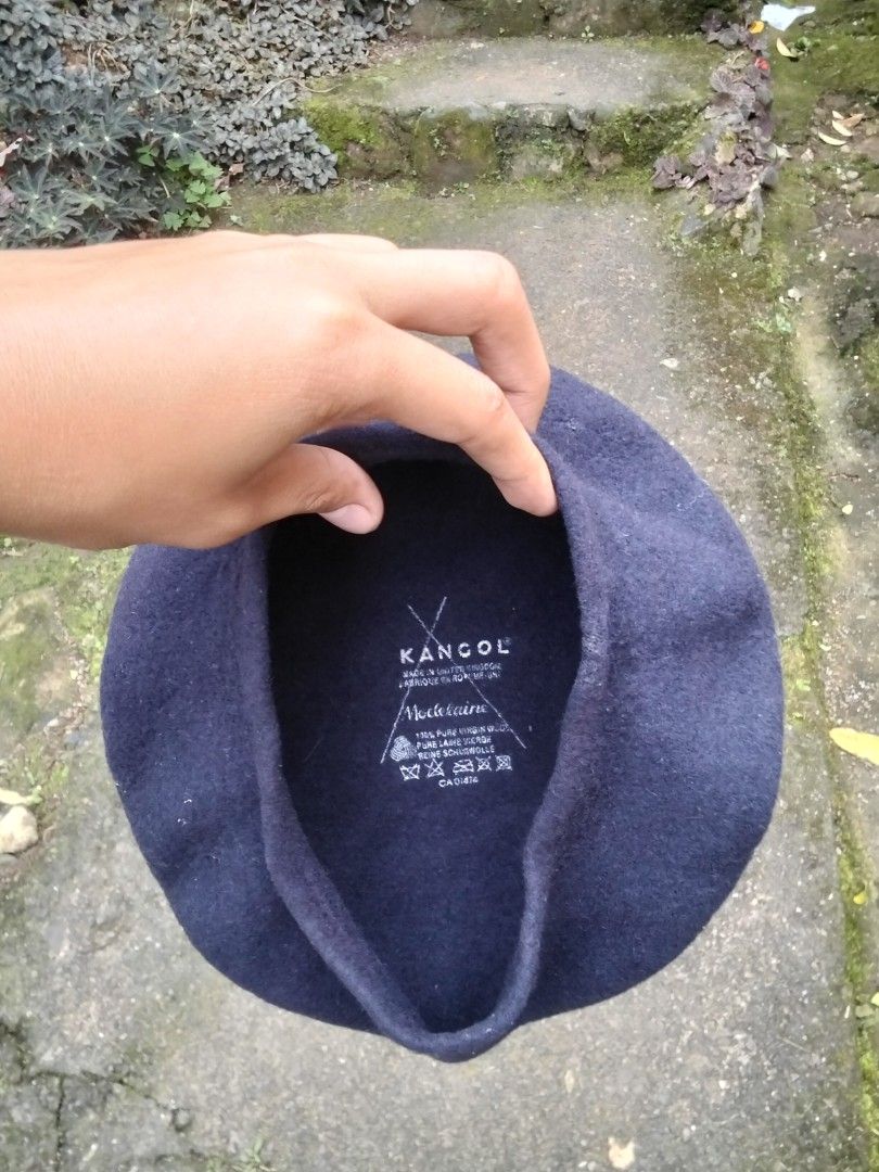 Kangol Wool Beret (Category: Caps & Hats) located in Quezon. Submitted by thrift.21 (Listing ID 1422306729, Image 3). Description: - Vintage Kangol beret - Made of wool - Classic round shape - Features Kangol label inside - Versatile accessory - Stylish and timeless.
