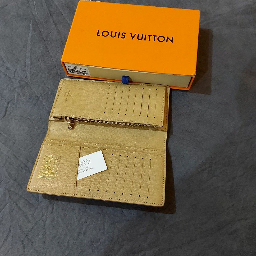 Louis Vuitton Long Wallet (Category: Luxury Bags & Wallets) located in La Trinidad. Submitted by marksols (Listing ID 1422241862, Image 2). Description: - Louis Vuitton long wallet - Unique floral and palm tree design - Comes with original box - Multiple card slots - Zippered coin compartment - Perfect for everyday use.