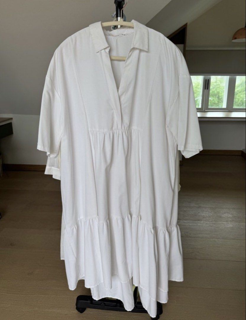Mango White Tiered Shirt Dress (Category: Dresses) located in San Juan City. Submitted by decluttzi (Listing ID 1422323522, Image 1). Description: - MNG white dress - Collared neckline - Short sleeves - Tiered skirt - Relaxed fit - Size M-L - Made in India.