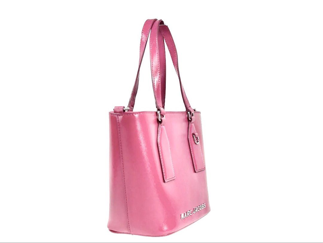 Marc Jacobs Candy Pink Hand Bag with Crossbody Strap (Category: Luxury Bags & Wallets) located in Manila. Submitted by lottielabouff (Listing ID 1422375775, Image 2). Description: Bought from Dubai for more than 1300AED (20k+PHP) Used in a barbie themed event Rfs: Can’t use the bag often. Hard to find an outfit that matches the color. It’s been sitting in my closet forever after the event where i used it. Selling for half the price. Not yet the l