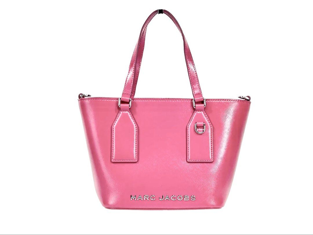 Marc Jacobs Candy Pink Hand Bag with Crossbody Strap (Category: Luxury Bags & Wallets) located in Manila. Submitted by lottielabouff (Listing ID 1422375775, Image 1). Description: Bought from Dubai for more than 1300AED (20k+PHP) Used in a barbie themed event Rfs: Can’t use the bag often. Hard to find an outfit that matches the color. It’s been sitting in my closet forever after the event where i used it. Selling for half the price. Not yet the l