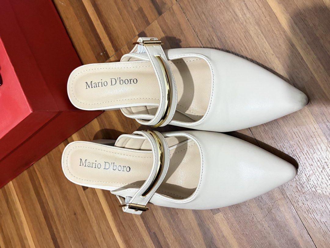 Mario D'boro Bone Mules Size 37 kitten heels (Category: Flats & Sandals) located in Manila. Submitted by hihihihi777 (Listing ID 1422307222, Image 3). Description: - used once only Mario D'boro mules - Color: Bone - Size: 37 - Features: Pointed toe, strap and buckle detail, block heel - Condition: Good.