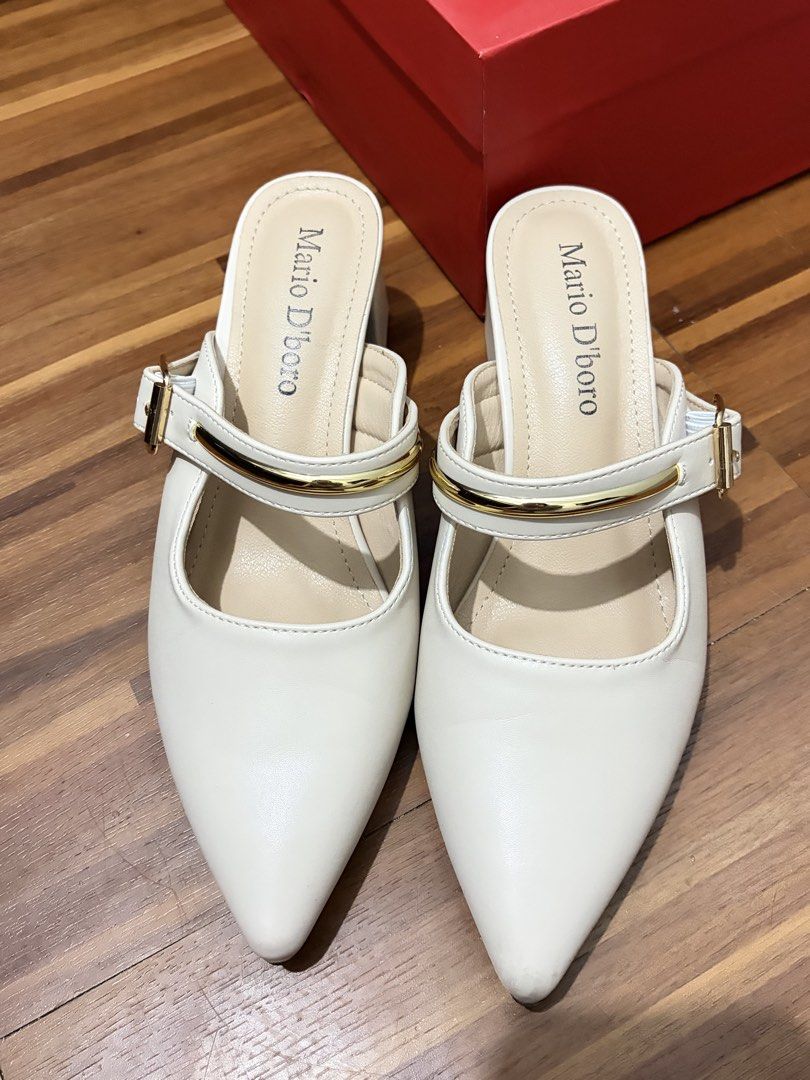 Mario D'boro Bone Mules Size 37 kitten heels (Category: Flats & Sandals) located in Manila. Submitted by hihihihi777 (Listing ID 1422307222, Image 1). Description: - used once only Mario D'boro mules - Color: Bone - Size: 37 - Features: Pointed toe, strap and buckle detail, block heel - Condition: Good.