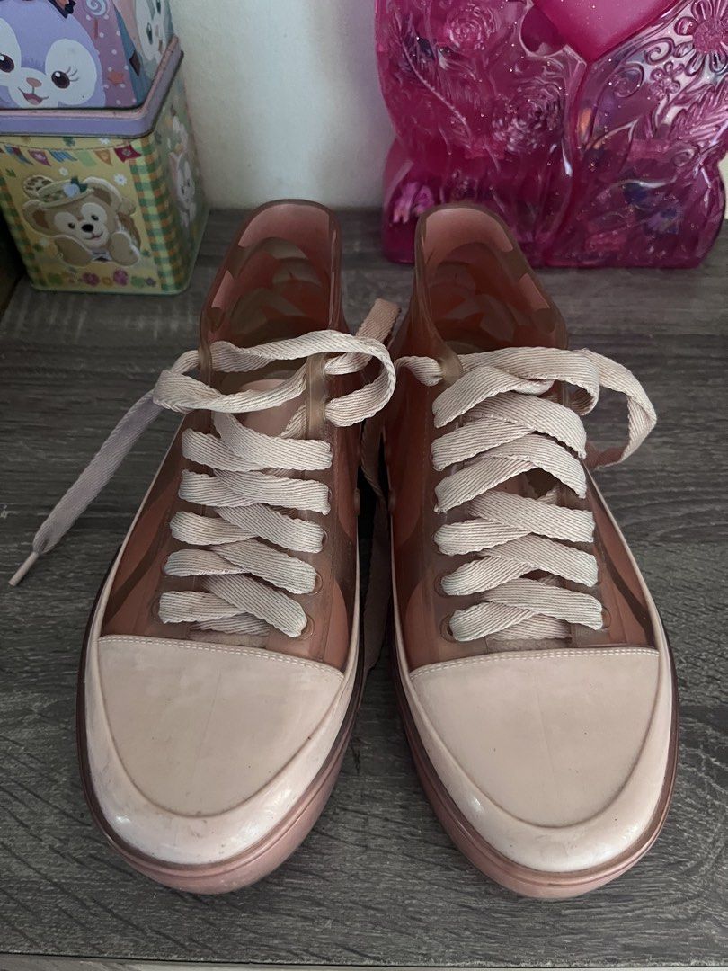 Melissa Pink Jelly Sneakers (Category: Sneakers) located in Cebu City. Submitted by abct1 (Listing ID 1422368440, Image 2). Description: - Melissa jelly sneakers - High-top design - Transparent upper - Solid pink sole - White laces - Brand name visible - Size: US 9A / EUR 33/34.