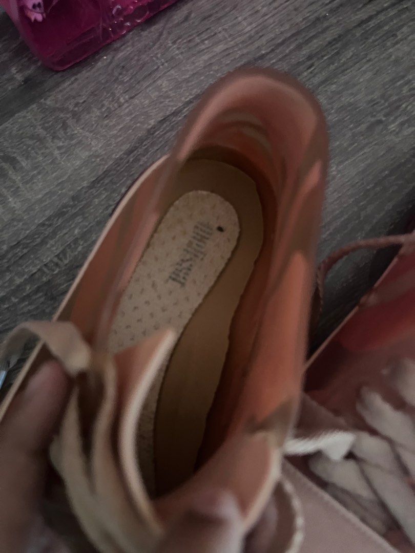 Melissa Pink Jelly Sneakers (Category: Sneakers) located in Cebu City. Submitted by abct1 (Listing ID 1422368440, Image 3). Description: - Melissa jelly sneakers - High-top design - Transparent upper - Solid pink sole - White laces - Brand name visible - Size: US 9A / EUR 33/34.