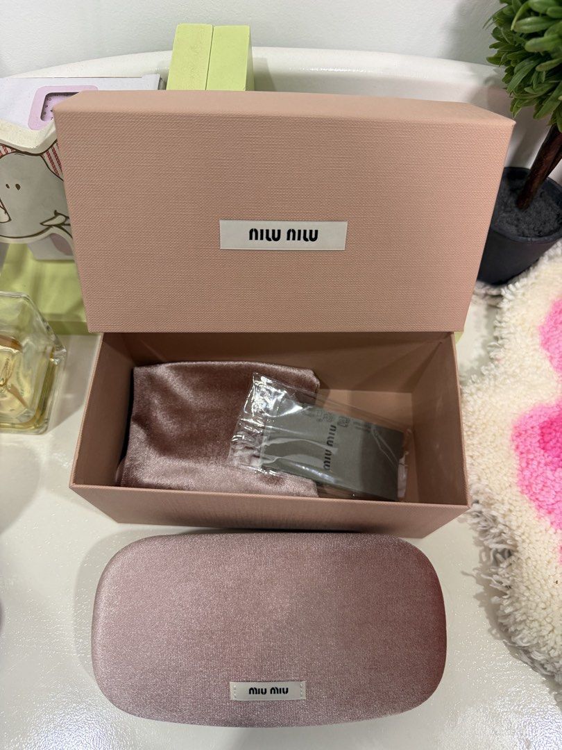 miu miu OMU 11ZS (Category: Sunglasses & Eyewear) located in Quezon City. Submitted by rab1029 (Listing ID 1422334406, Image 2). Description: OMU 11ZS Complete with box and hard case Brand new: Never been used RFS: Impulsive buy DF: Shouldered by buyer.