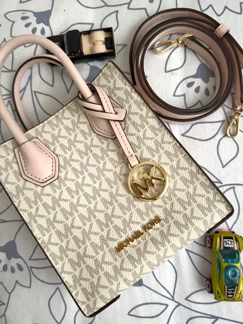 MK mercer extra-small (Category: Luxury Bags & Wallets) located in Calamba. Submitted by awiandradezara (Listing ID 1381086756, Image 2). Description: RFS: Declutterring Mk mercer pebble leather in pink Very pretty in actual Bought in canada for 5.9k Like new and now issue 💡Reminders: » Prices are EXCLUSIVE of Shipping Fee » Courier: Flash Express or J&T shipping fee depends on your location » Mode of Payment: BPI ; Gcash ; Maya » Delivery Lead 