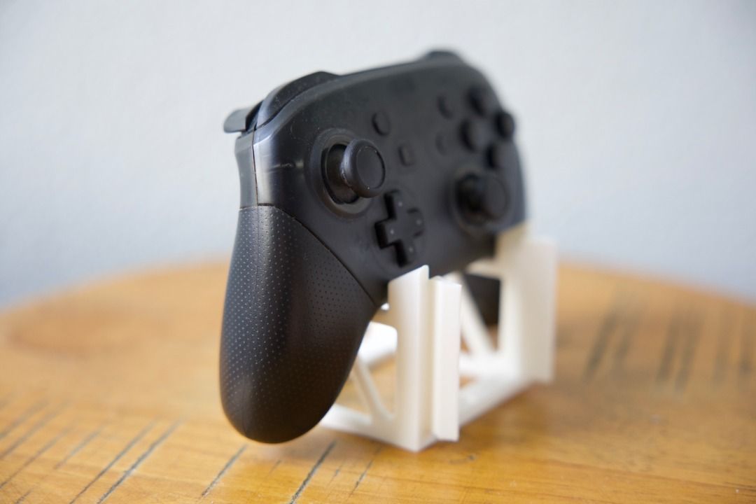Modular PS5 / PS4 / Nintendo Switch Pro Controller Stand | Expandable Desktop Holder | Minimalist Black (Category: Controllers) located in Mandaluyong City. Submitted by heyitslaaaance (Listing ID 1422239335, Image 3). Description: Organize your gaming desk with this Modular Switch Pro Controller Holder. Unlike standard stands, this features a smart, interlocking design that allows you to connect multiple units together as your collection grows. 