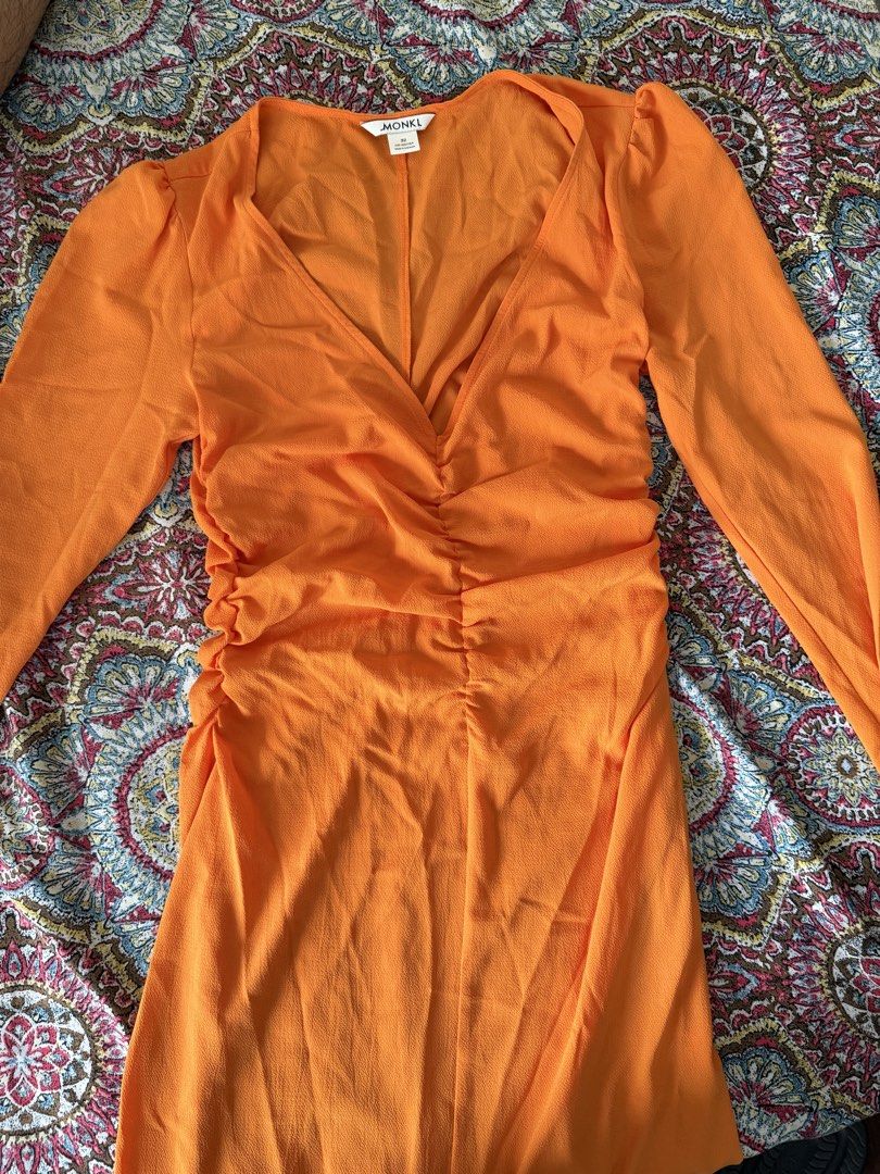 Monki Orange Midi Dress (Category: Dresses) located in Manila. Submitted by declutterwkb (Listing ID 1422266044, Image 2). Description: - Used once - Monki orange midi dress - Size can fit xs-s - V-neckline - Long sleeves - Ruched detailing - Front slit.