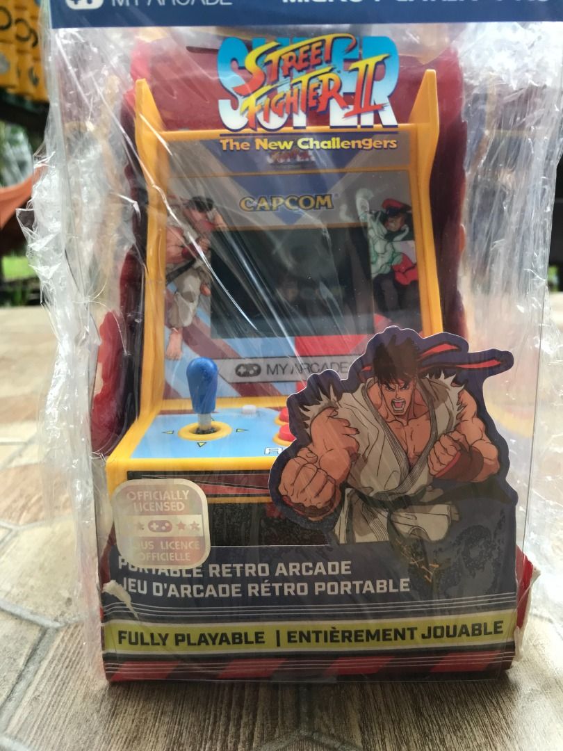 My Arcade - Micro Player PRO Super Street Fighter II (Category: Others) located in Santa Rosa. Submitted by aeonkraft2026 (Listing ID 1422305086, Image 2). Description: Super Street Fighter II: The New Challengers is the ultimate fighting game experience! With four new characters, four new stages, and enhanced gameplay, this is the definitive version of Street Fighter II. With its iconic characters, fluid animation, and enhanced gameplay with new