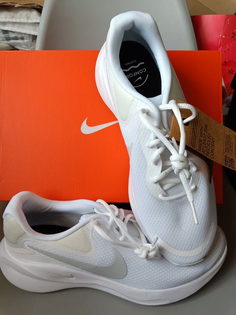 Nike Revolution 7 White Sneakers (Category: Sneakers) located in Cavite. Submitted by disyc (Listing ID 1422307668, Image 2). Description: - Nike Revolution 7 sneakers - Color: White - Size: 11.5 US / 10.5 UK / 43.5 EUR - Includes original box and tags - Made with at least 20% recycled content.