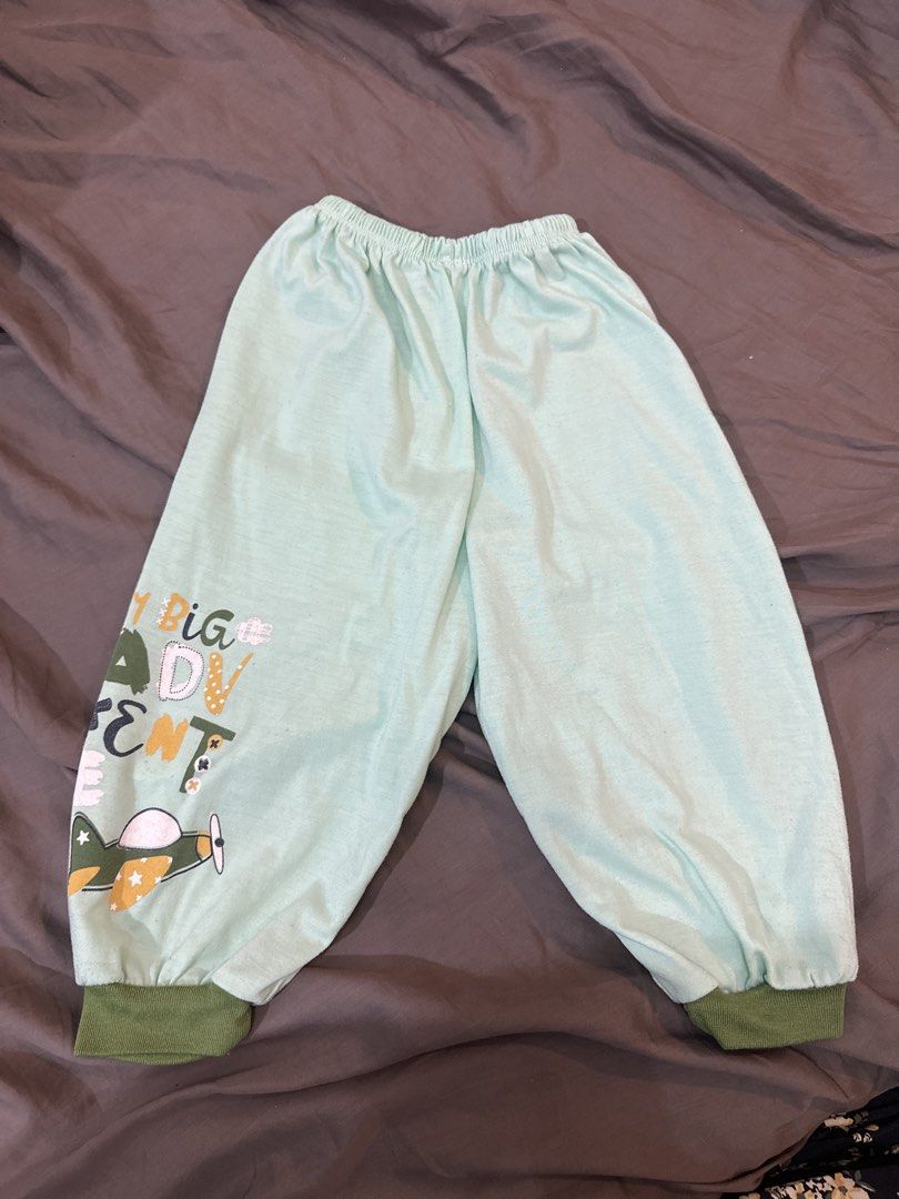 Pajama/Pants for Toddlers (Category: Babies & Kids Fashion) located in Taguig. Submitted by declutzy (Listing ID 1422323192, Image 3). Description: - Baby/Toddler boy pants -Large Size (1 year old to 2 years old) - Fun prints: dinosaurs, airplanes, polka dots - Elastic waistband and cuffs - Comfortable for everyday wear.