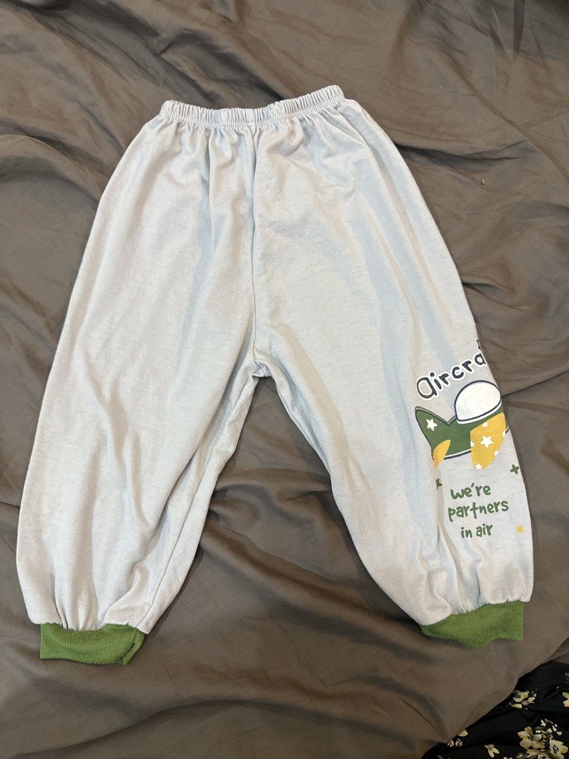 Pajama/Pants for Toddlers (Category: Babies & Kids Fashion) located in Taguig. Submitted by declutzy (Listing ID 1422323192, Image 2). Description: - Baby/Toddler boy pants -Large Size (1 year old to 2 years old) - Fun prints: dinosaurs, airplanes, polka dots - Elastic waistband and cuffs - Comfortable for everyday wear.