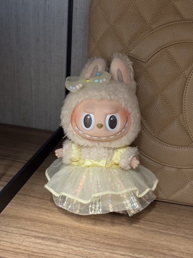 Pop Mart Labubu Exciting Macaron Soy Milk (Category: Designer & Blind Box Toys) located in San Juan City. Submitted by nikkakelly (Listing ID 1422359295, Image 1). Description: - like new condition, no damages - no more box or inclusions - yellow dress and head clip included 💛 - 100% authentic Loc: West Ave., Quezon City Ships via J&T, Lalamove, Grab.