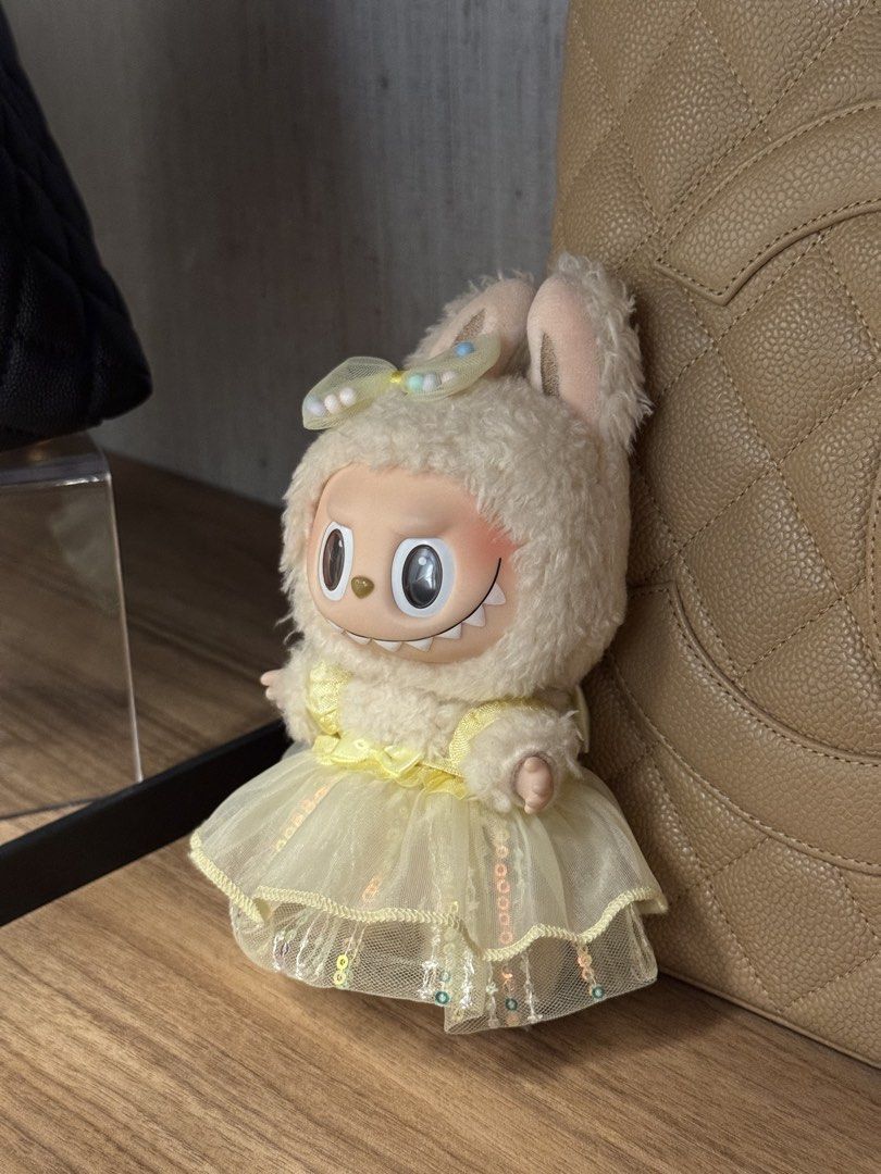 Pop Mart Labubu Exciting Macaron Soy Milk (Category: Designer & Blind Box Toys) located in San Juan City. Submitted by nikkakelly (Listing ID 1422359295, Image 2). Description: - like new condition, no damages - no more box or inclusions - yellow dress and head clip included 💛 - 100% authentic Loc: West Ave., Quezon City Ships via J&T, Lalamove, Grab.