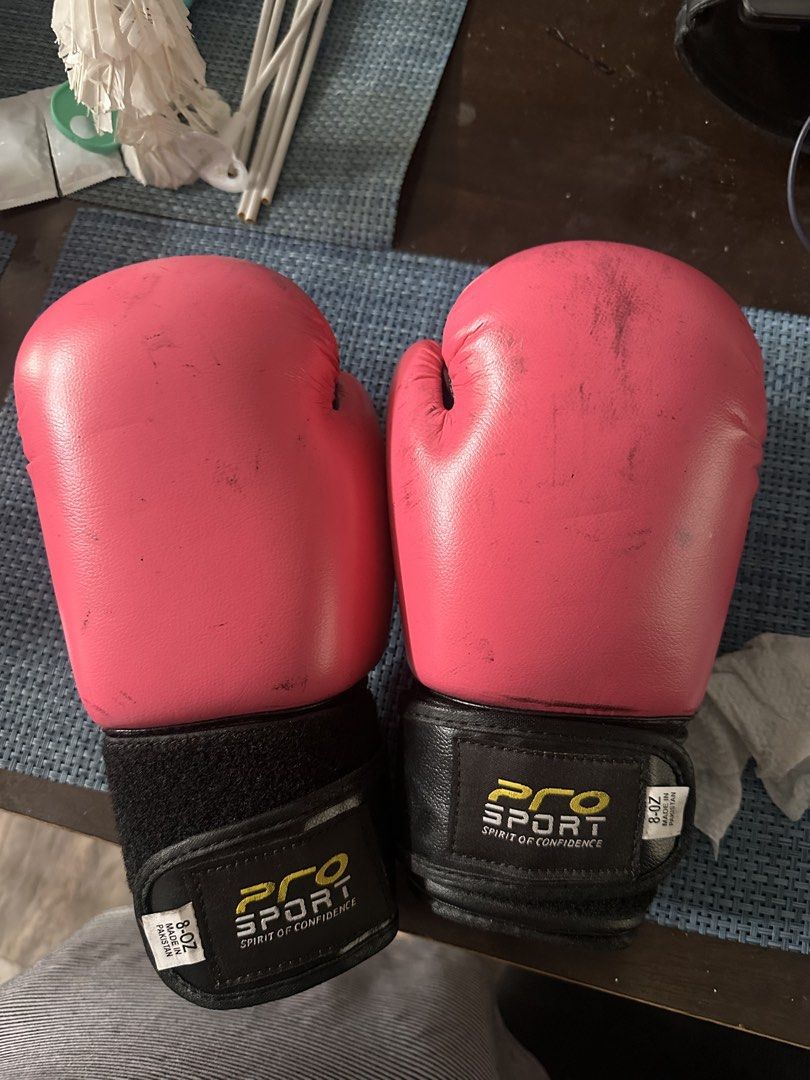 Pro Sport Boxing Gloves 8oz (Category: Combat Sports) located in Quezon City. Submitted by decluttertherapymnl (Listing ID 1422310895, Image 1). Description: For Sale Used Boxing Gloves pero natambak. Issue: Leather melt? Kumakapit black ink? RFS: Di ginamit ng binigyan Pick up at Pasig Payment online or upon pick up .